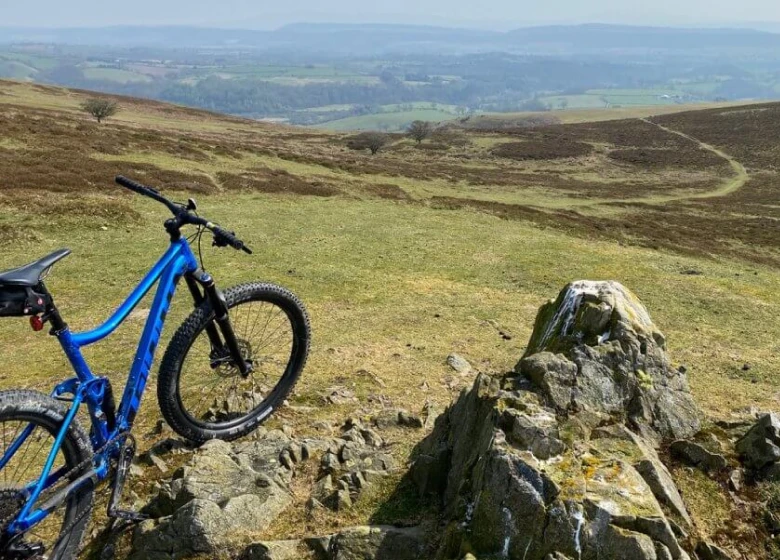 Bike in the Shropshire Hills overlooking a scenic view