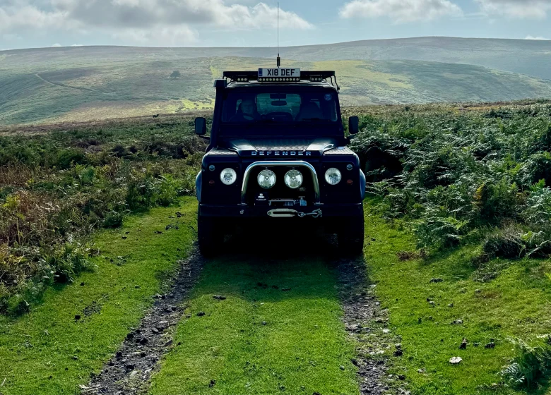Land rover in field a view of the front of the car